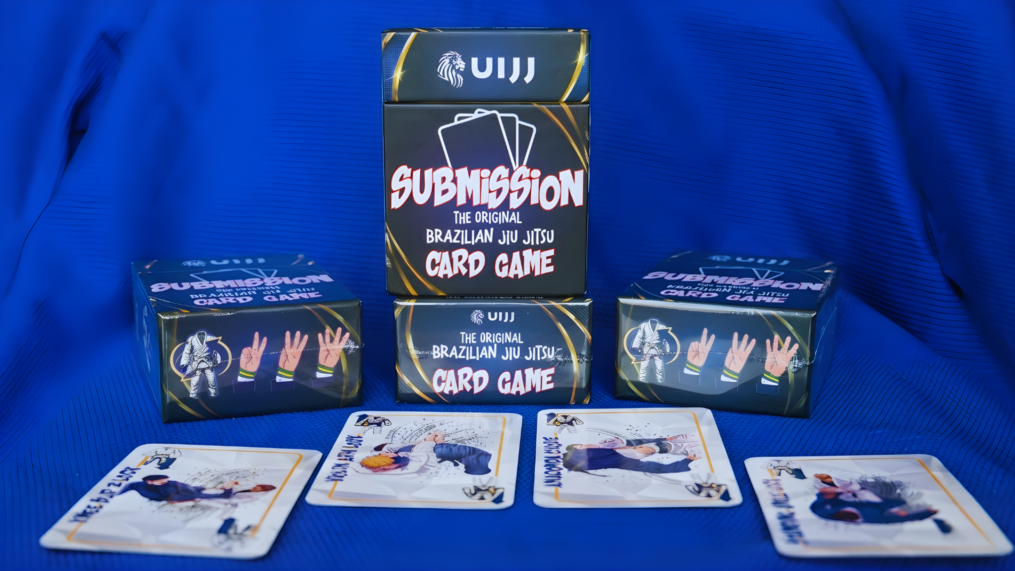 Premium hero packshot — deck box + fanned cards on dark luxury background